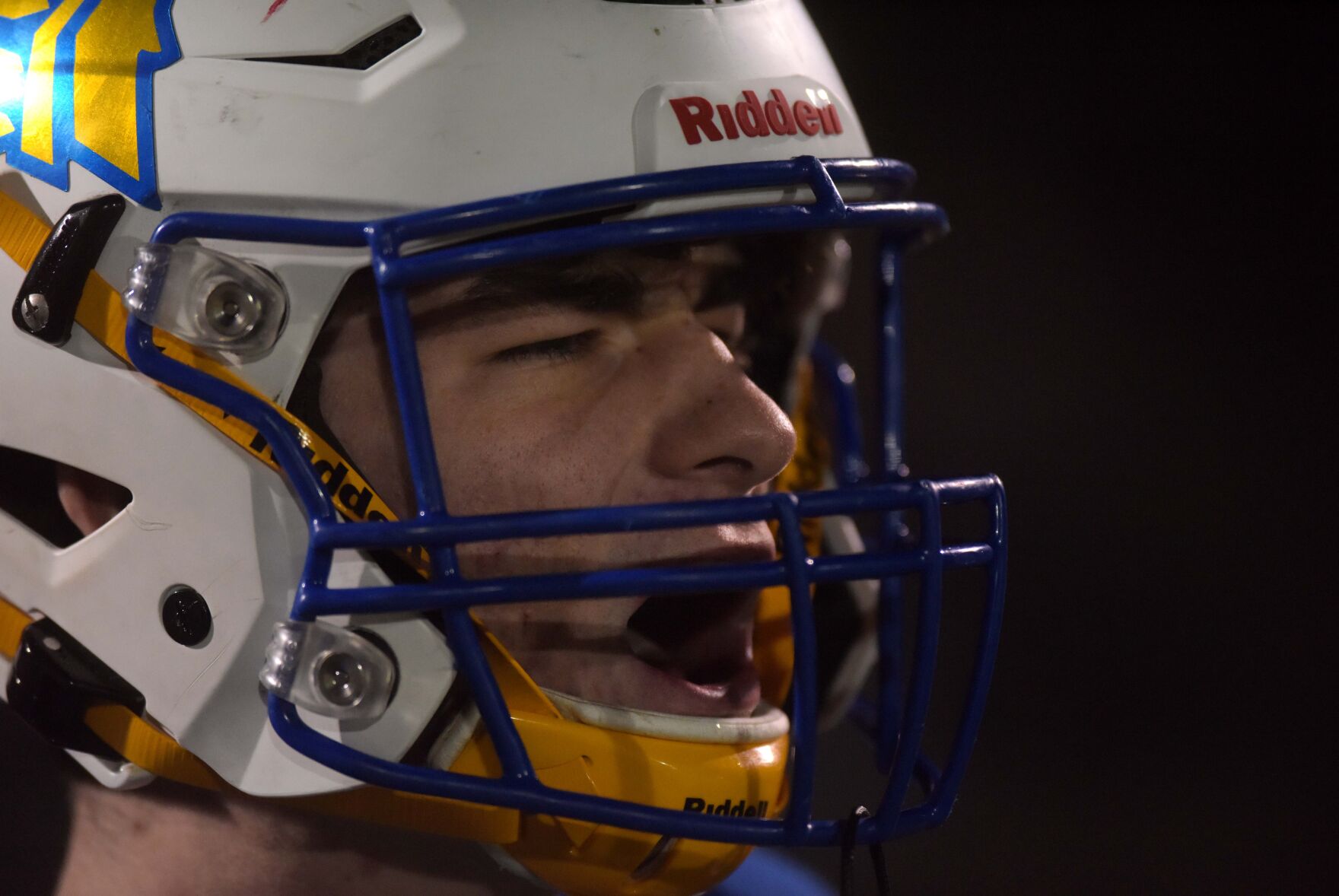 St. Pius X High School junior kicker Benjamin Hess shouts